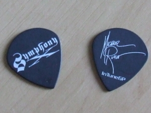 A picture of two plectrums I received from Michael Romeo during the show